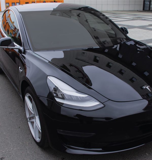 Tesla windshield tinting USA A front view of a Tesla with window film installed to the windshield